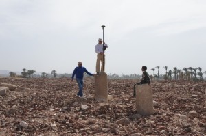Jay Heidel taking a reading on a survey point located on a column along the cardomaximus