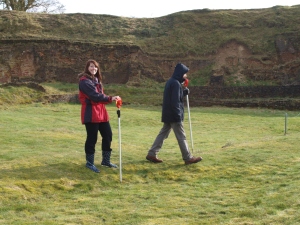 Detailed staff and prism work on the earthworks of the old house