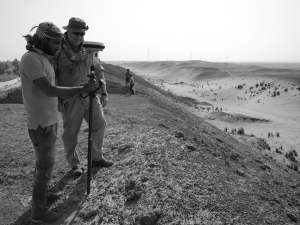 Kamal Helmy Shared and Dominic Barker surveying on top of the mounds at Birket Habu