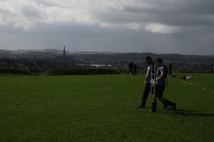 Geophysical survey in the Outer Bailey with the spire of Salisbury Cathedral visible in the background